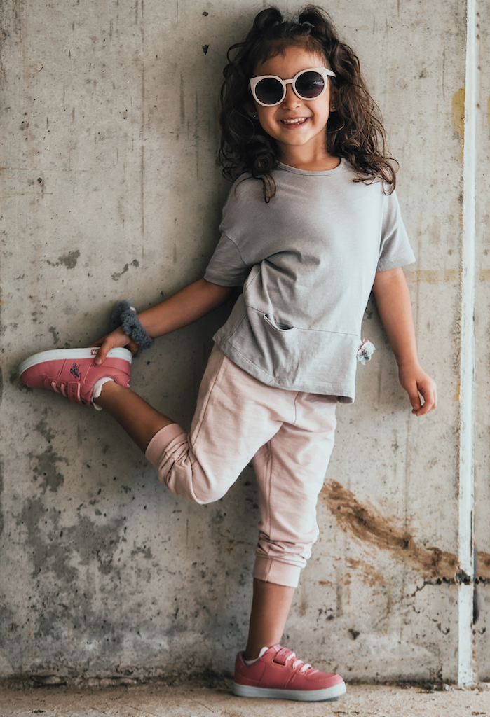 Find the perfect bottom for your little girl with our collection of stylish and comfortable kids' pants, shorts, skirts, and leggings. Shop now in sizes 4-14