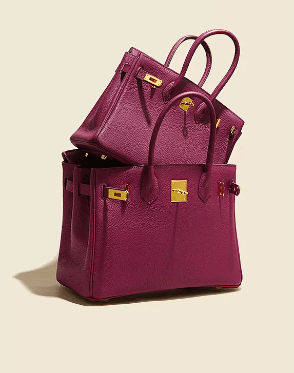 Chic Bordeaux Handbag Embellished with Gleaming Gold Features