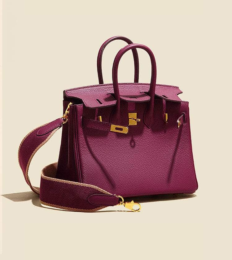 Chic Bordeaux Handbag Embellished with Gleaming Gold Features