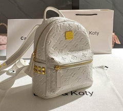 Chic Spade Embossed Backpack with Metal Deco