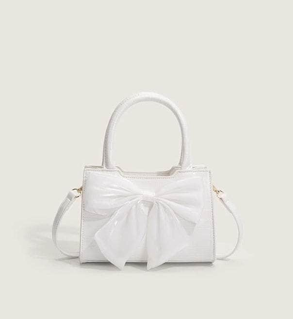 Classy Leather Handbag with Stylish Bow Detailing