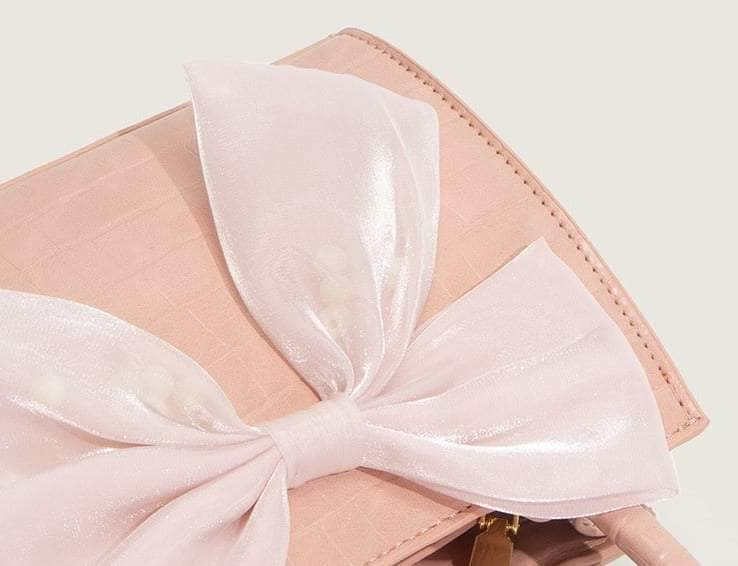 Classy Leather Handbag with Stylish Bow Detailing