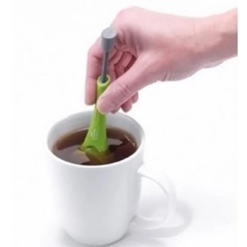 Compact Tea Infuser with Built-in Plunger for intense flavor. Reusable and versatile for tea and coffee