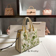 Elegant Crossbody Leather Handbag with Flowery Detail