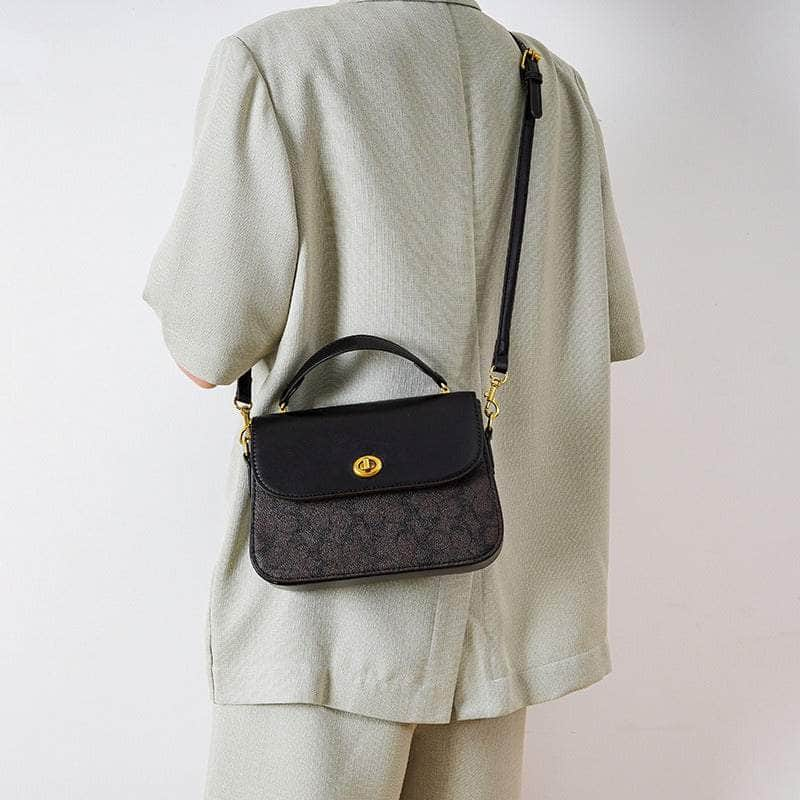 Elegant Signature Canvas Top Handle Handbag