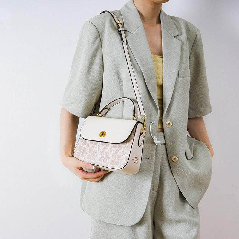 Elegant Signature Canvas Top Handle Handbag