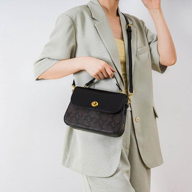 Elegant Signature Canvas Top Handle Handbag