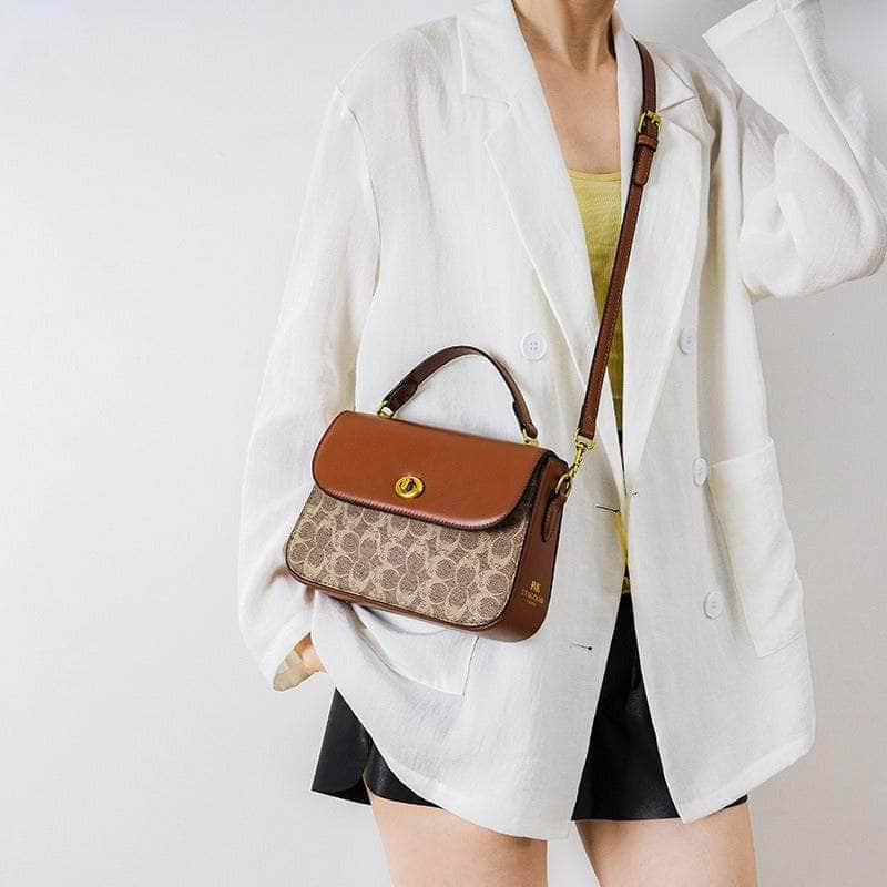 Elegant Signature Canvas Top Handle Handbag