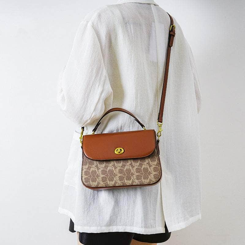 Elegant Signature Canvas Top Handle Handbag