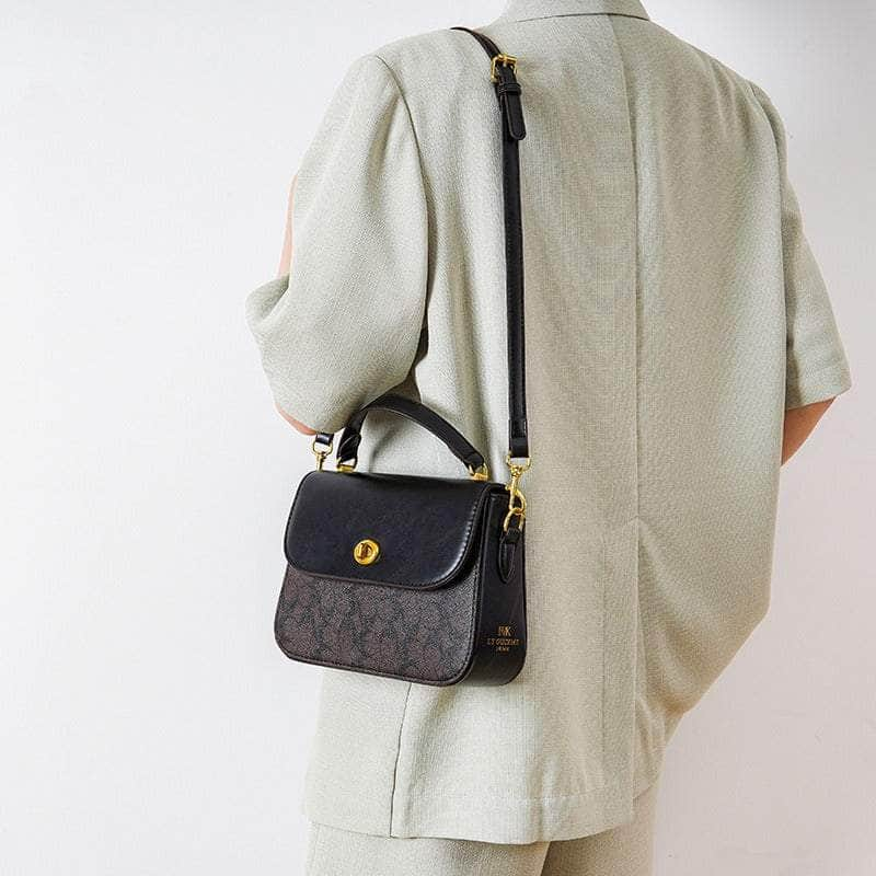 Elegant Signature Canvas Top Handle Handbag