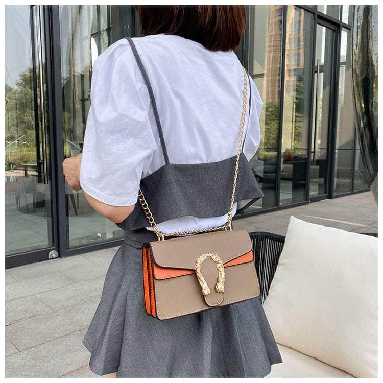 Exquisite Crossbody Bag with Snake Buckle