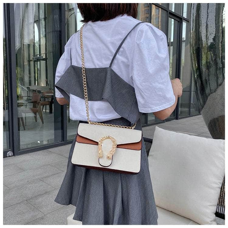 Exquisite Crossbody Bag with Snake Buckle