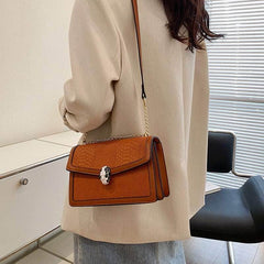 Fashion-Forward Square Bag with Snake Buckle