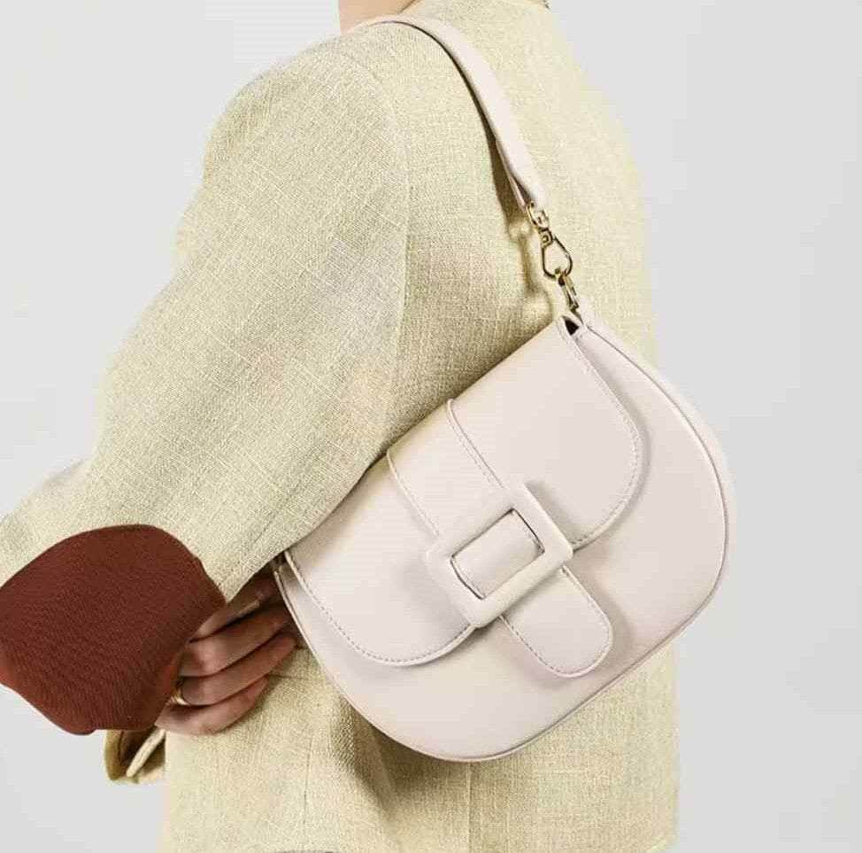 Flap-Top Saddle Bag with Intricate Buckle Detailing