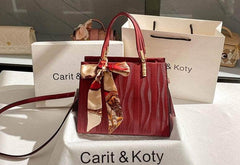 Gleaming Gold Metal Accentuated Handbag Red