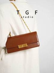 Gleaming Metal Buckle Accented Chain Shoulder Bag