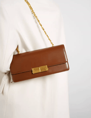 Gleaming Metal Buckle Accented Chain Shoulder Bag