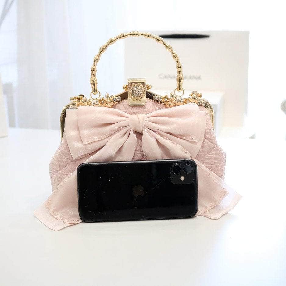 Large Bow Detailed Shimmery Top Handle Purse