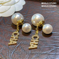 Letter Deco Double-Sided Pearl Stud Earrings White