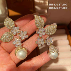 Paved Crystal Leaf Floral Pearl Deco Earrings White