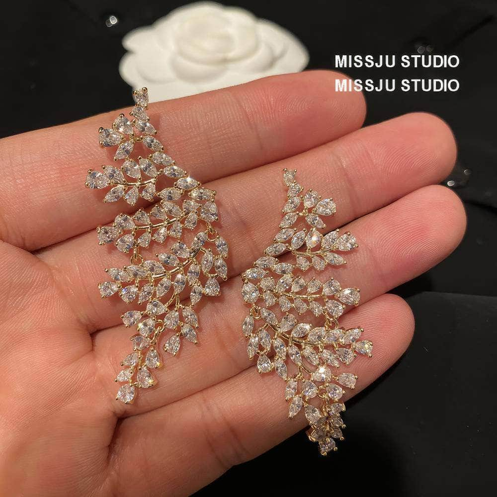 Paved crystals leaf Deco Gold Statement Earrings White