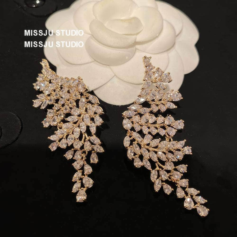 Paved crystals leaf Deco Gold Statement Earrings White