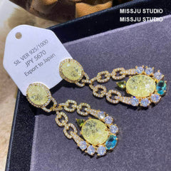 Shimmery Crackle Glass Paved Crystal Earrings Yellow