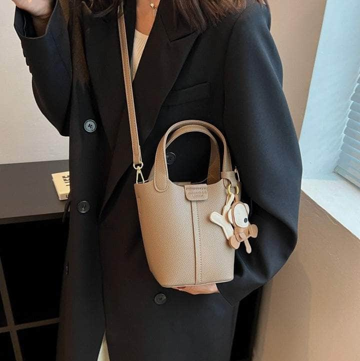 Sleek Crossbody Bucket Bag with Bear Charm