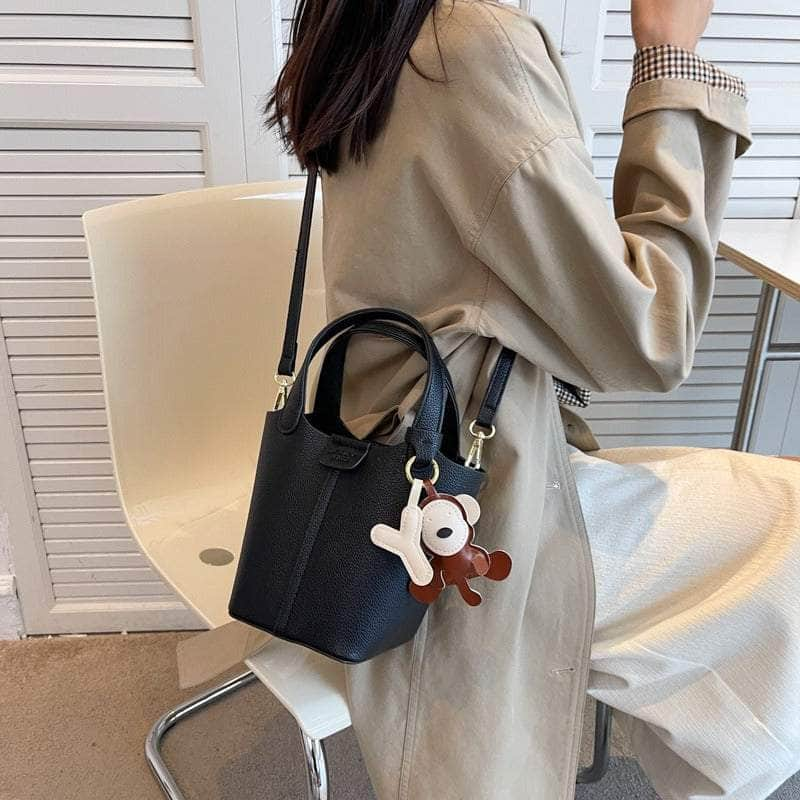 Sleek Crossbody Bucket Bag with Bear Charm