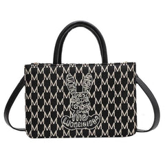 Sleek Shoulder Handbag adorned with Graphic Print