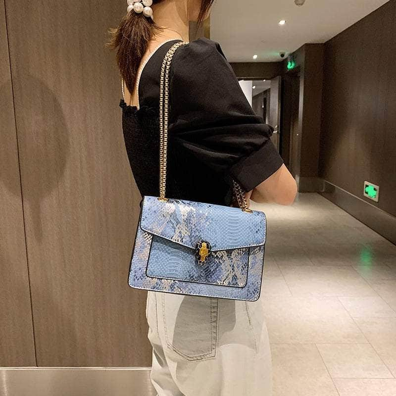 Sleek Snake Pattern Crossbody Bag with Stylish Buckle Blue