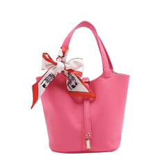 Top Handle Bucket Bag with Intricate Lock Accents